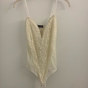 Beautiful lace cream bodysuit